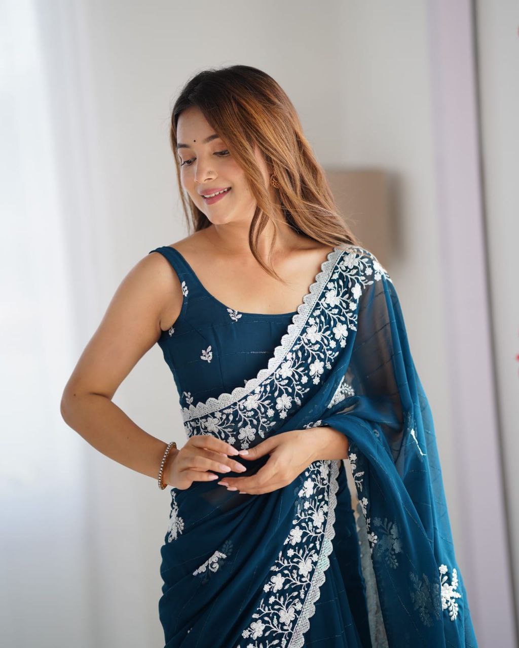 Teal Blue Georgette Saree Roohri