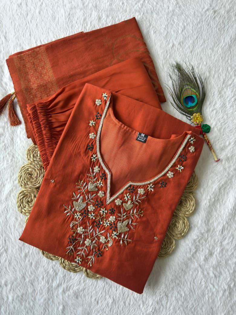 Orange hand embroidered suit set Roohri