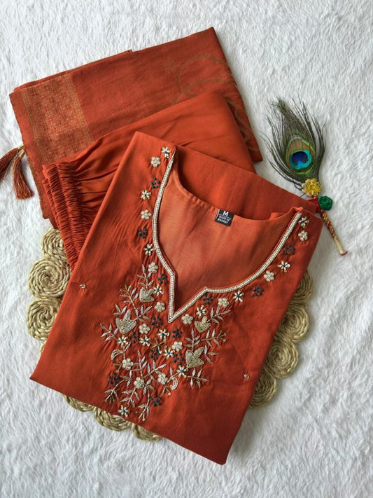 Orange hand embroidered suit set Roohri